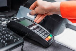 Person using payment terminal