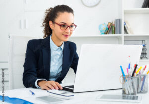 Portrait of successful businesswoman in office.