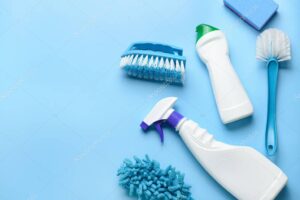 Set of cleaning supplies on color background