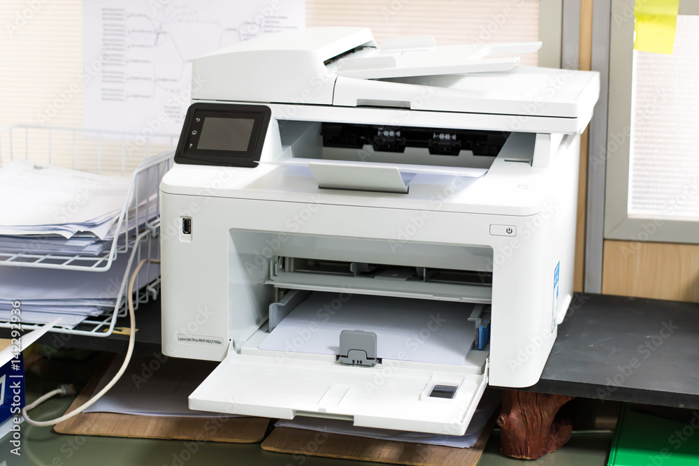 White printer and paper laser printer.