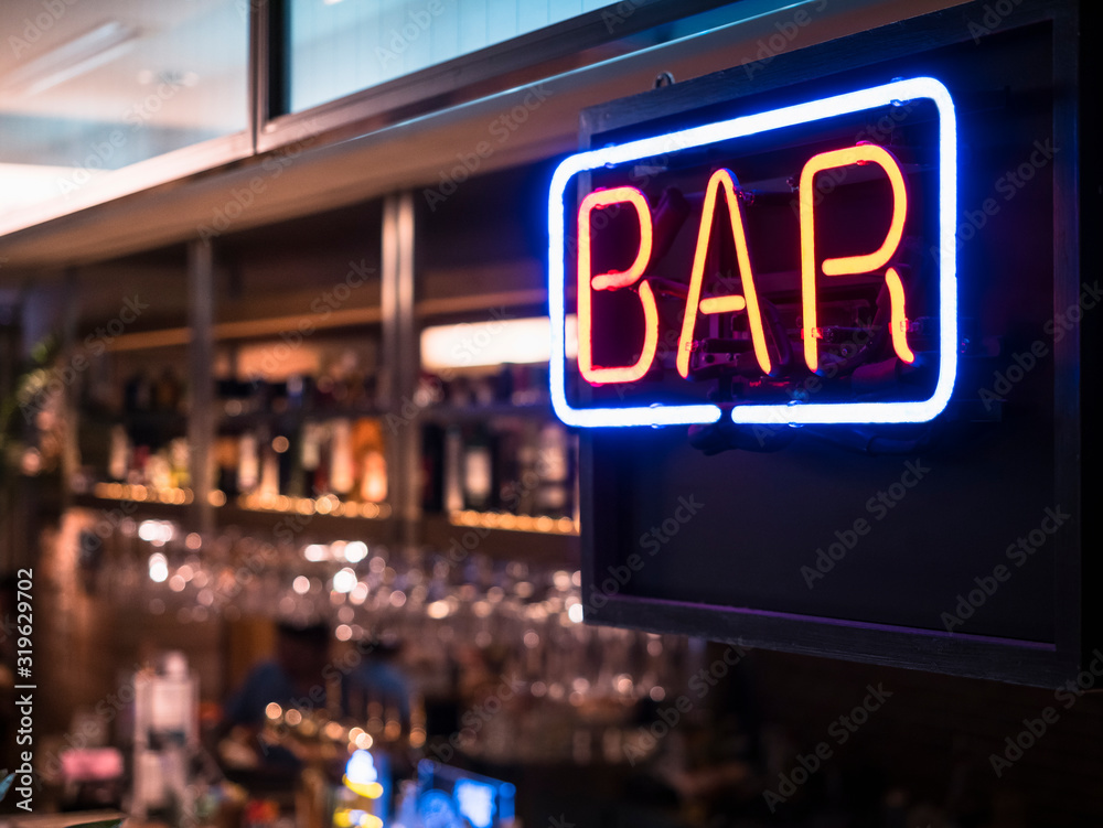 Bar Neon sign with Blur counter bar background