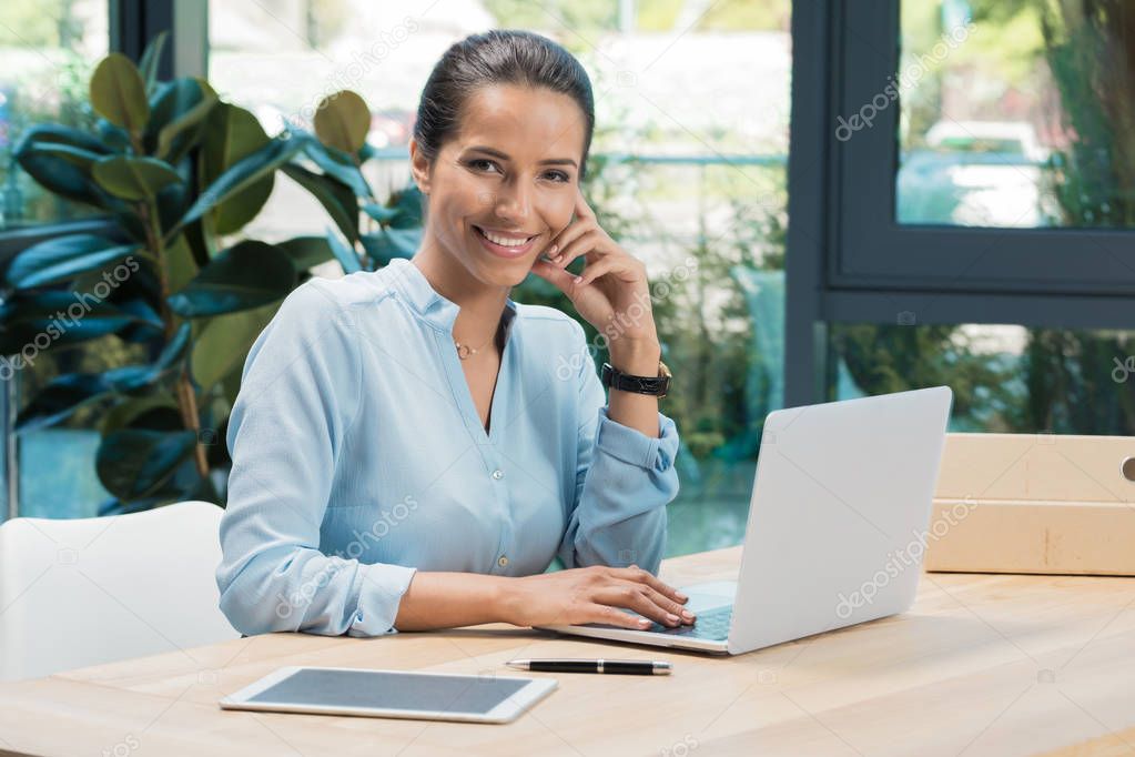 businesswoman sitting on workplace