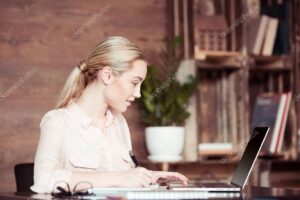 Businesswoman working with laptop