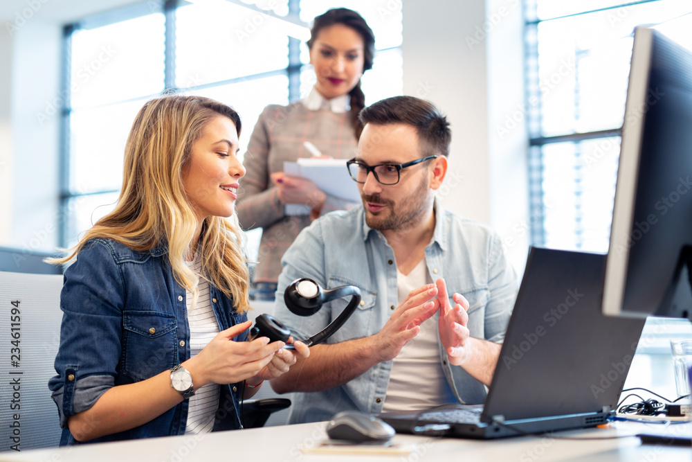 Office manager explaining to new employee what her job is at call center.