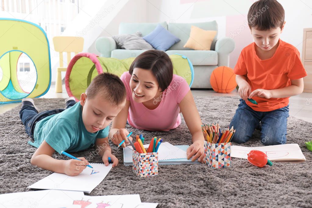 little boys drawing with nanny