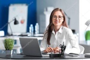 Young businesswoman working in office
